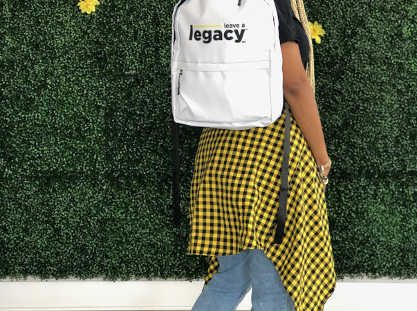 Leave A Legacy backpack worn on the shoulder