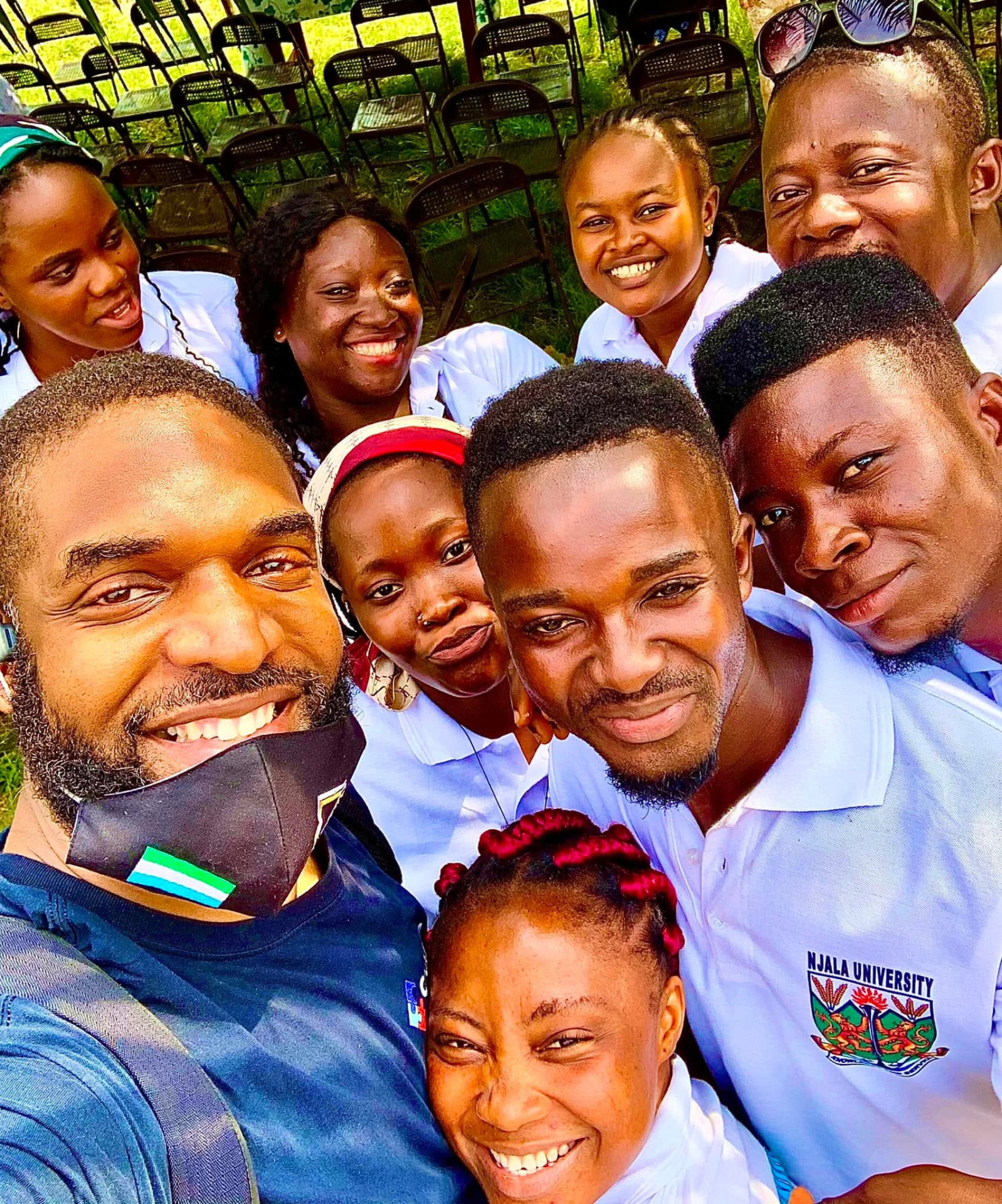 Jay Cameron with a group of university students in Sierra Leone